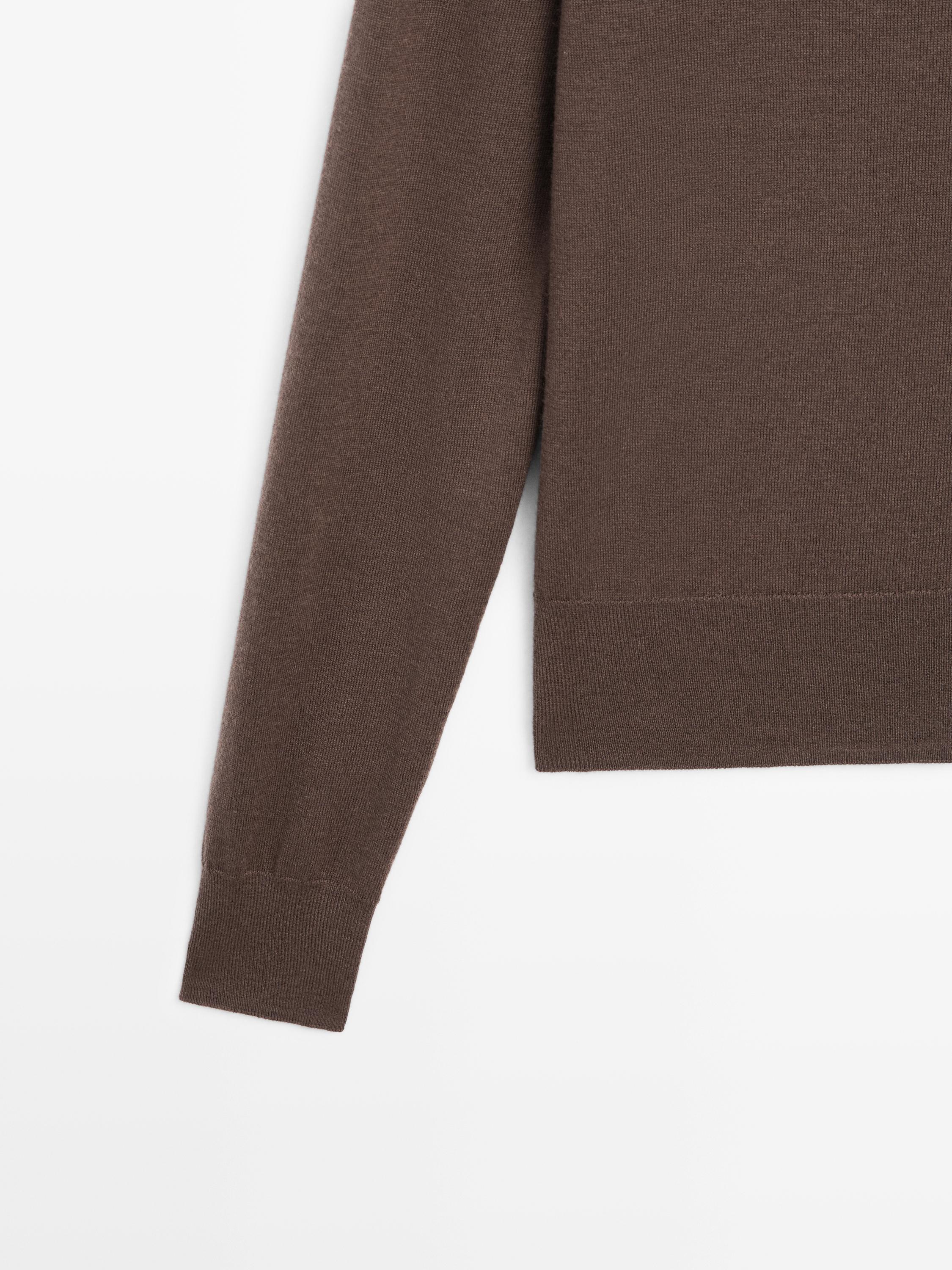 Mock turtleneck button-up sweater